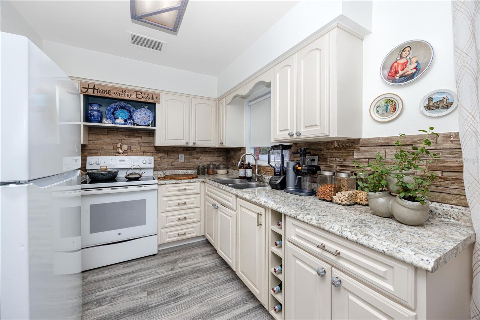 Kitchen with updated cabients and granite countertops