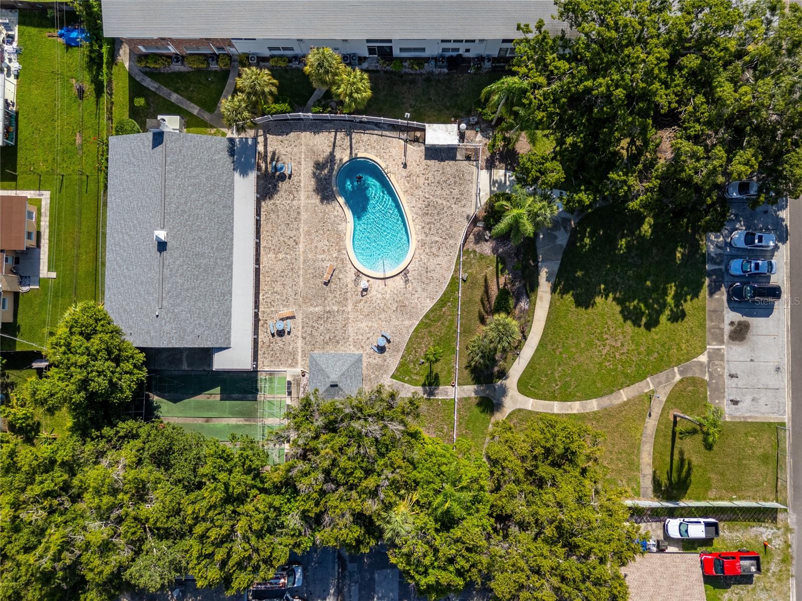 Aerial view of the community pool and clubhouse