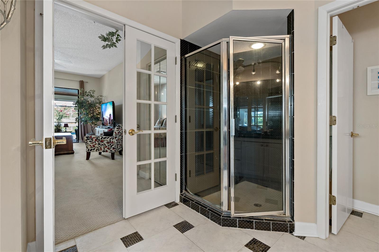 WALK IN SHOWER IN THE PRIMARY BATHROOM