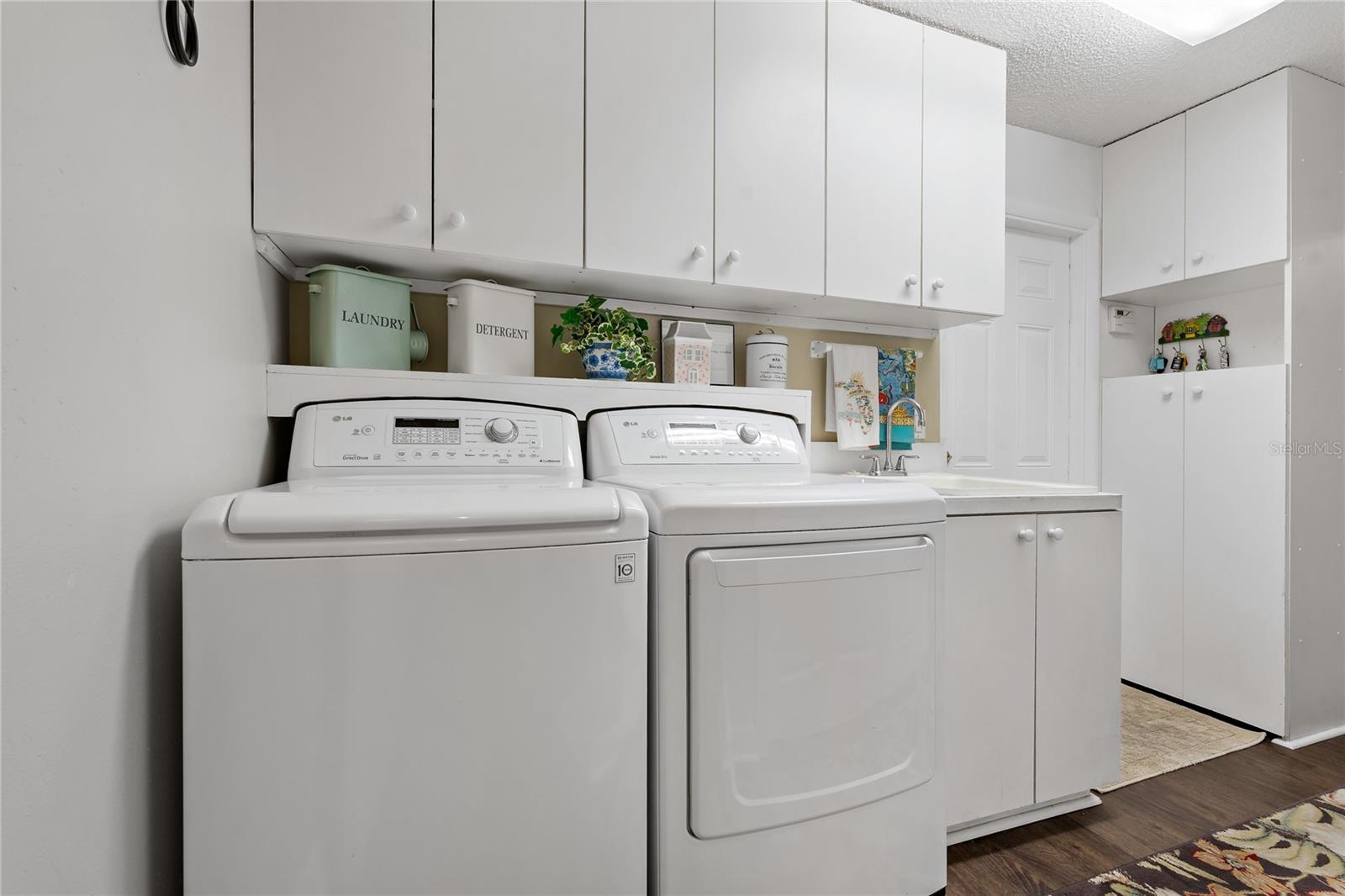 LAUNDRY ROOM WITH AMAZING STORAGE SPACE!
