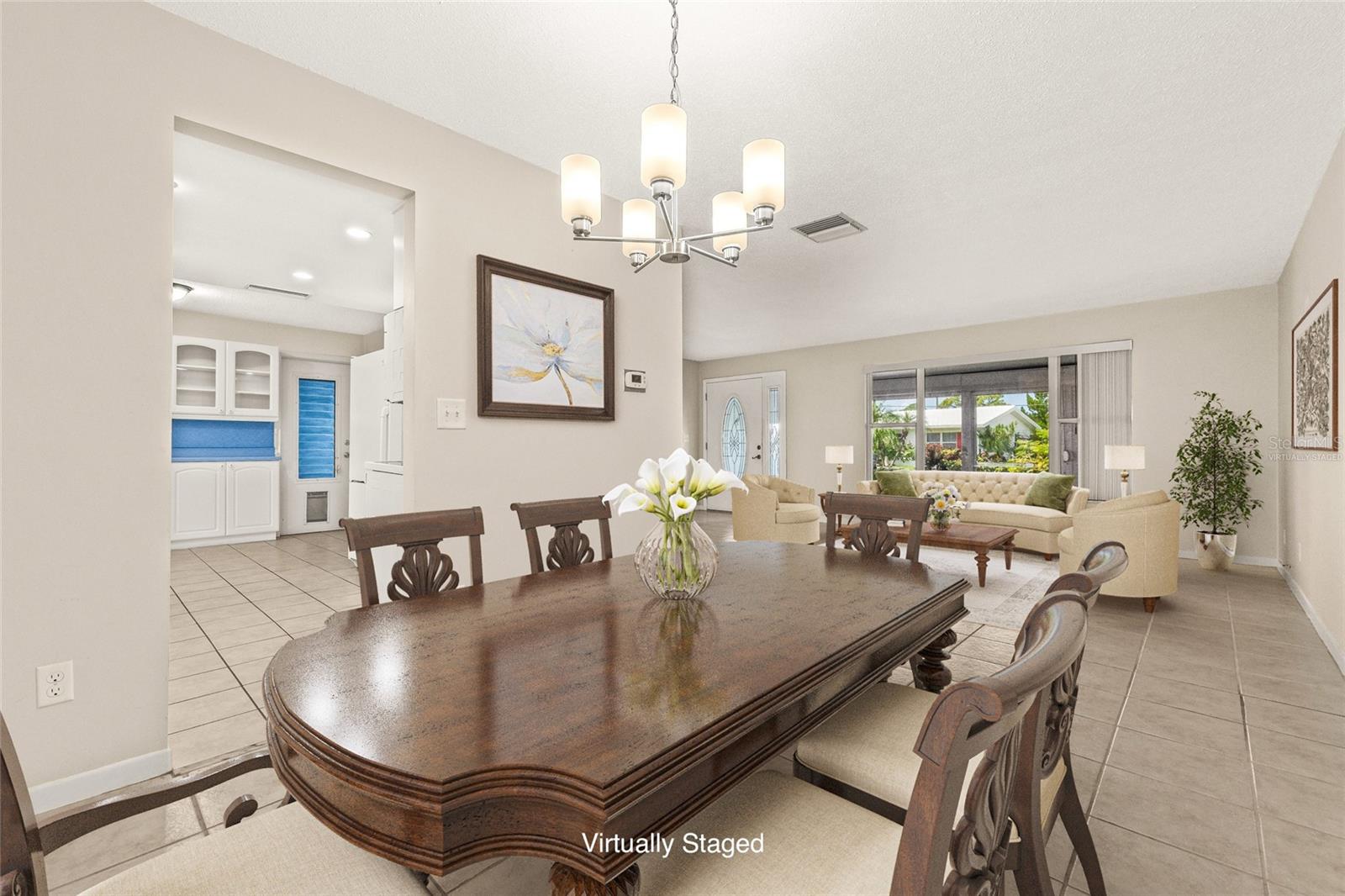 Virtually Staged. Dining Room. Gather around the table with family.