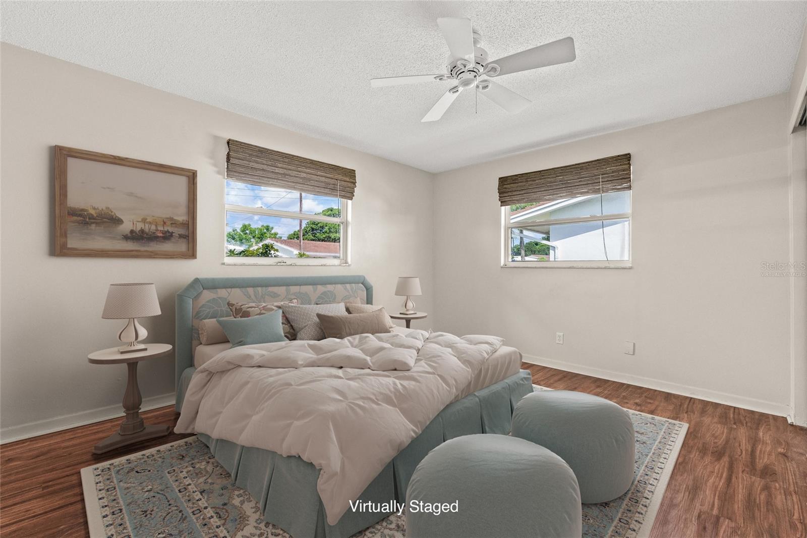 Virtually Staged. Front bedroom with 2 closets.