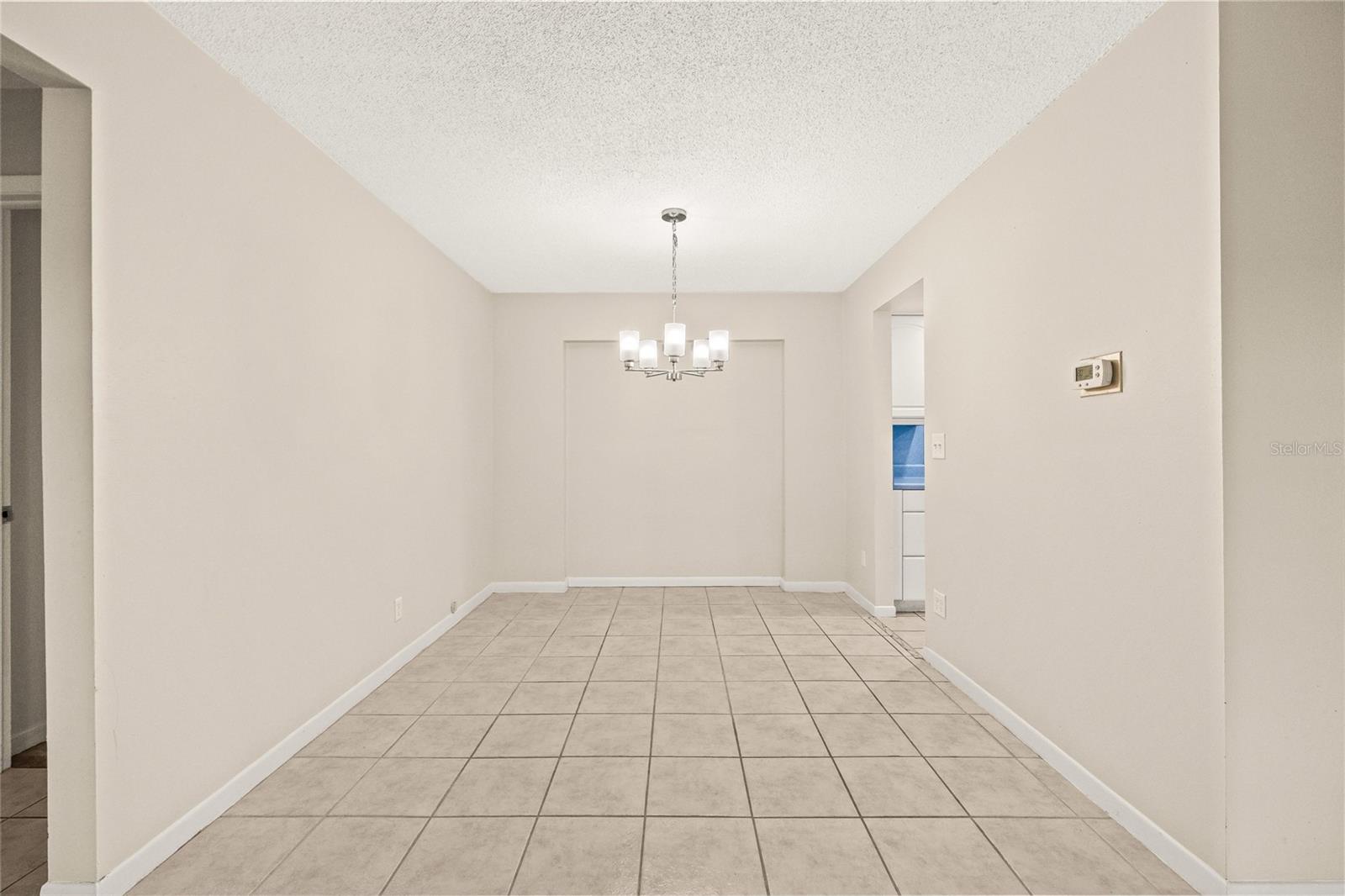 Wall between the dining area and office can easily be removed.