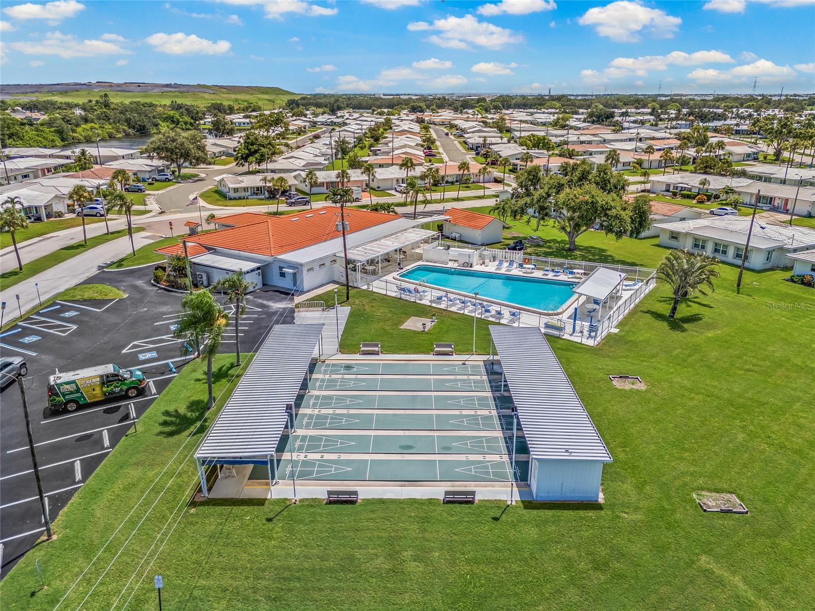 Club house, shuffle board courts and community pool- Unit 3.