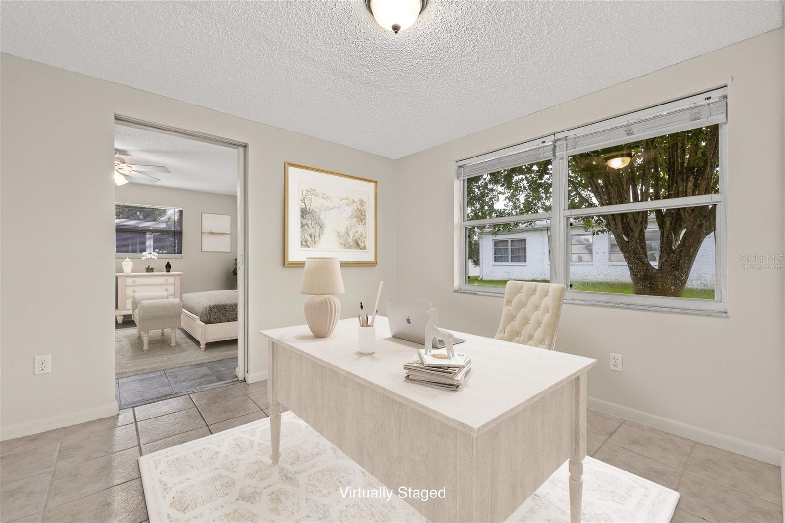 Virtually Staged. Bonus room used as a home office.