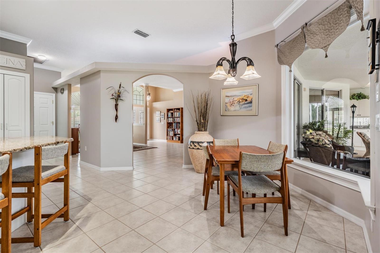 Arched doorway is a great touch, along with crown molding