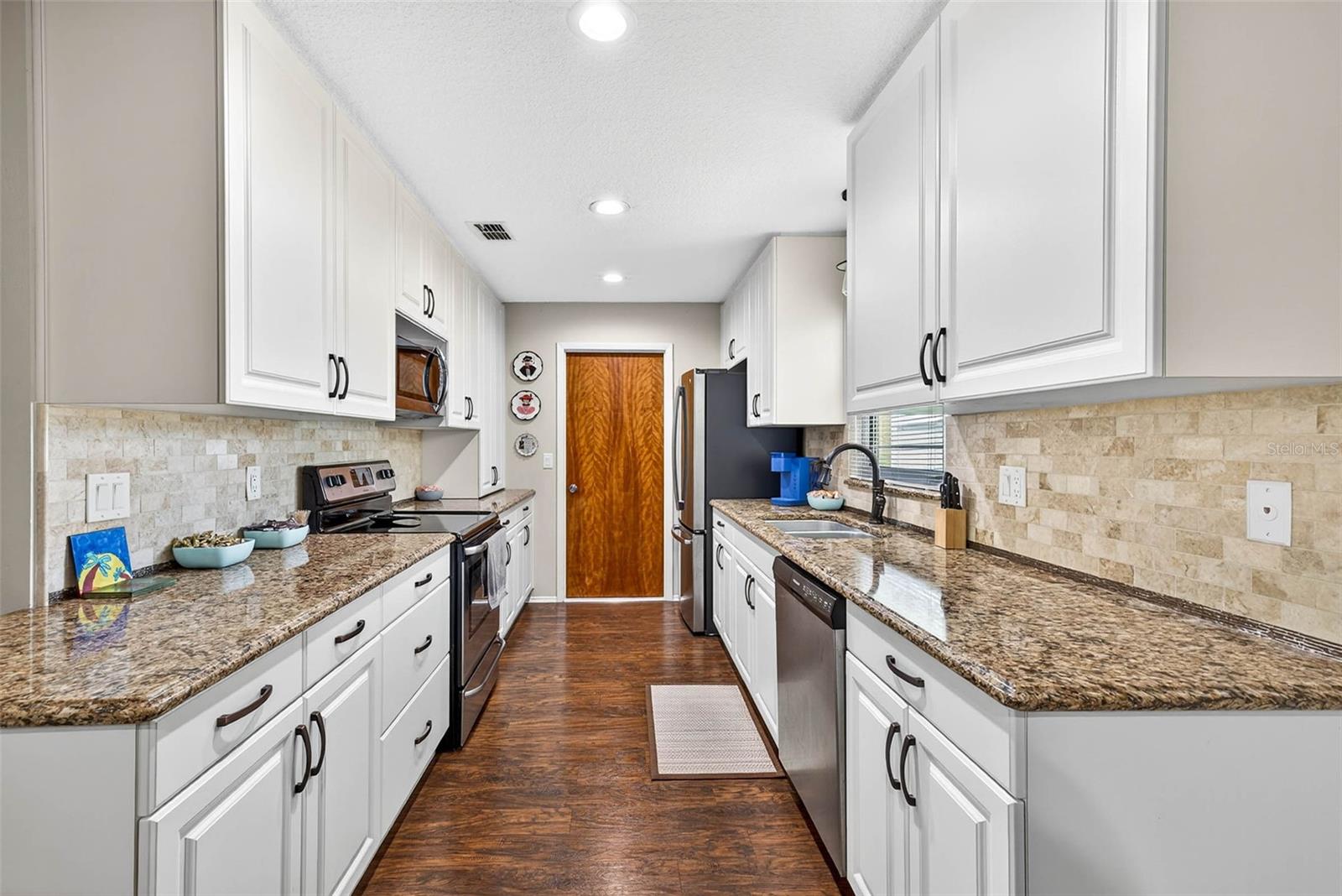 Kitchen leading to garage