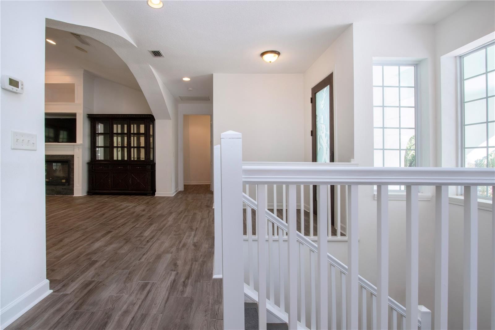 HALLWAY TO THE STAIRS GOING TO THE 1ST FLOOR