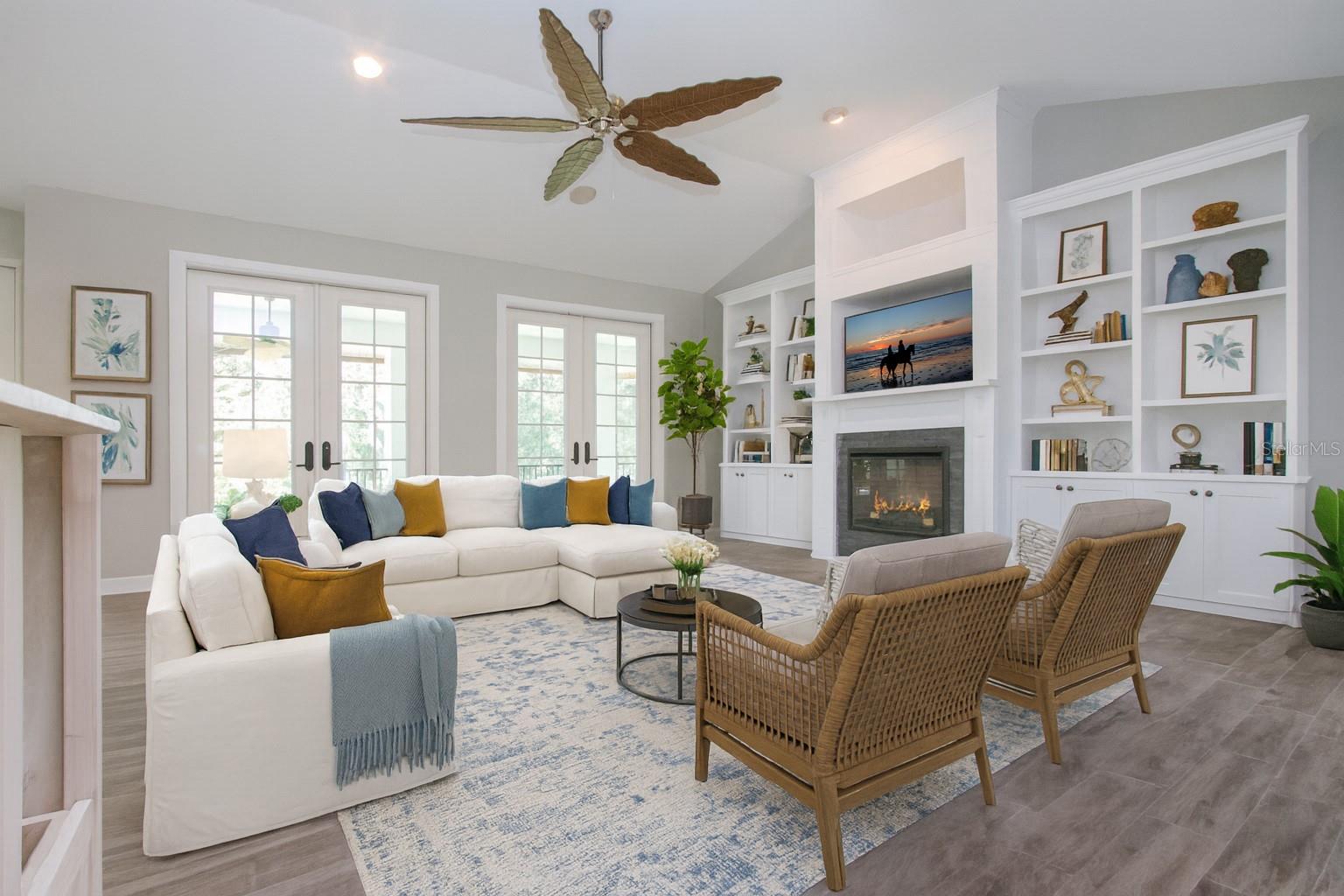 STAGED VIEW OF LIVING ROOM ALTERING THE COLOR OF THE BUILT INS