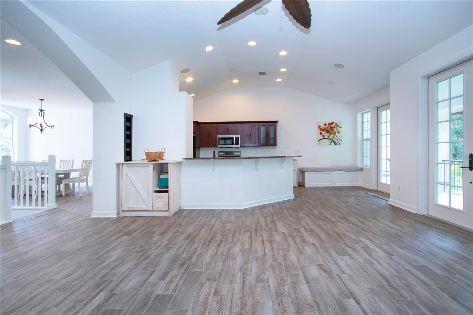 VIEW OF THE KITCHEN FROM THE LIVING ROOM