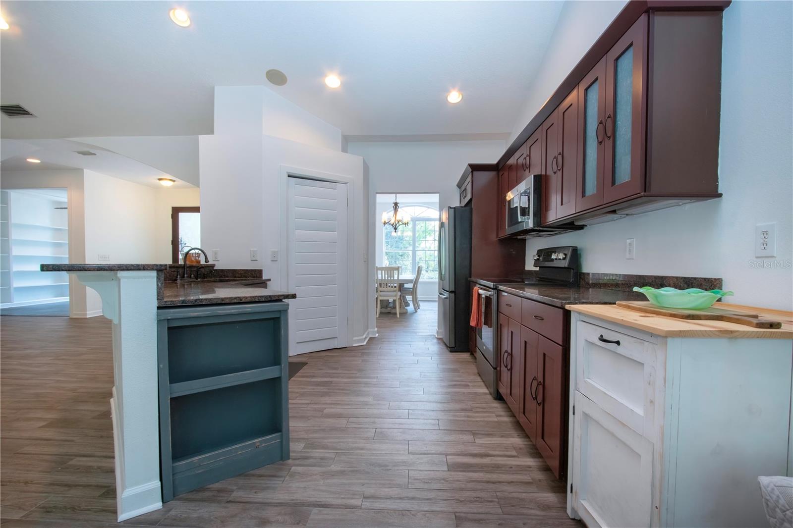 KITCHEN LEADING TO THE DINING ROOM