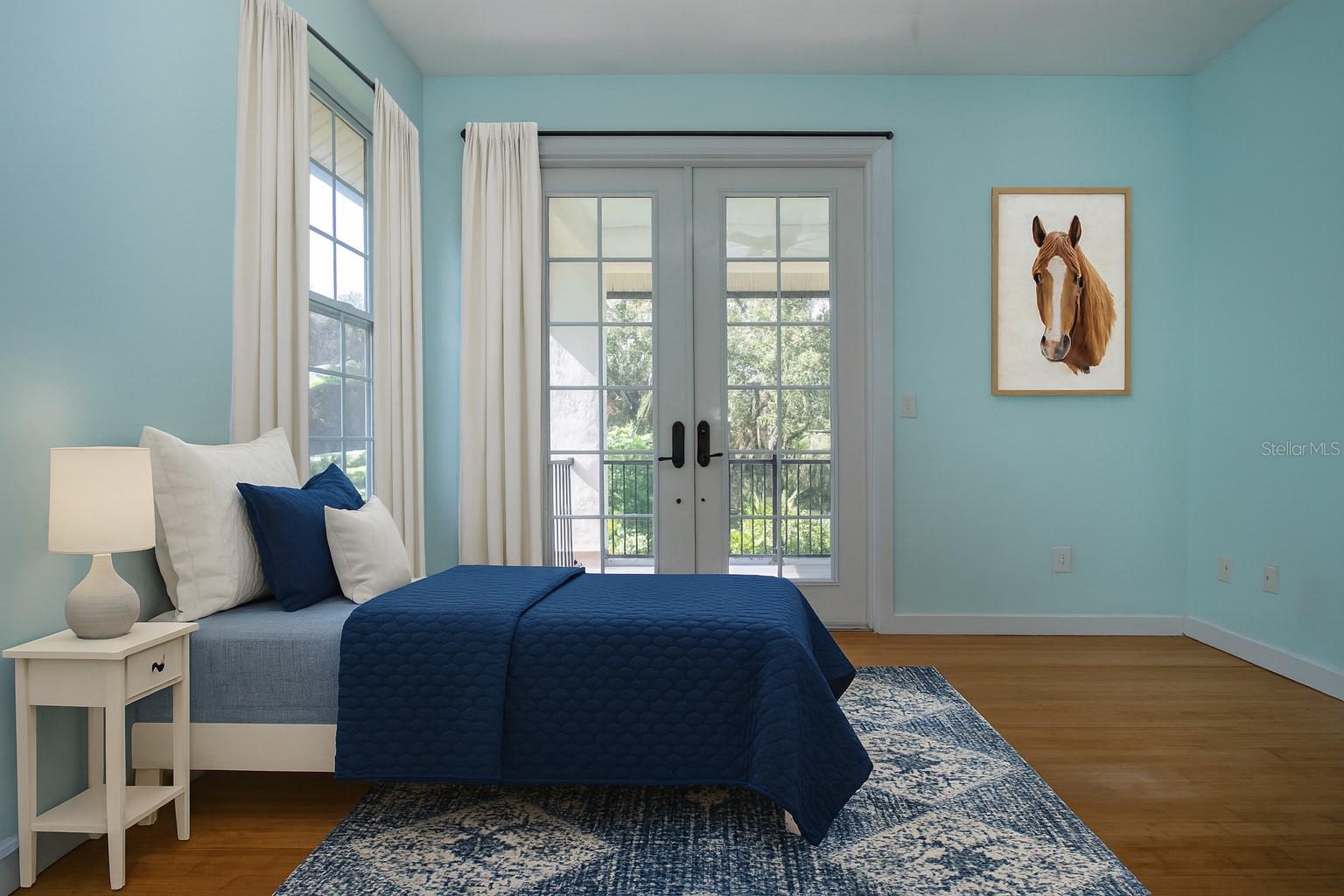 STAGED PHOTO OF 2ND BEDROOM