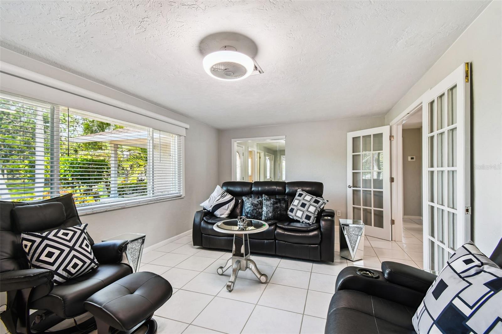 Notice the large picture window overlooking Vina Del Mar Park and the French doors that lead to the kitchen