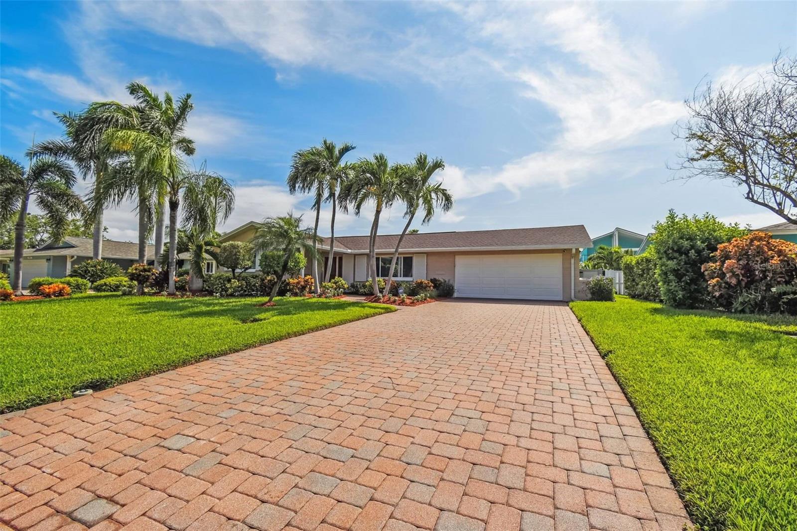 Generous driveway that can accommodate up to 6 vehicles!