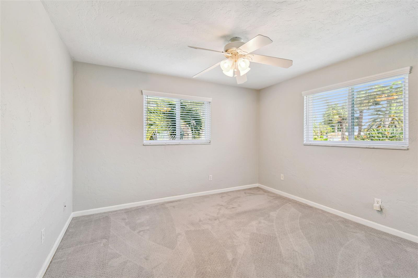 Nice size room, again with that neutral palette that matches any decor!