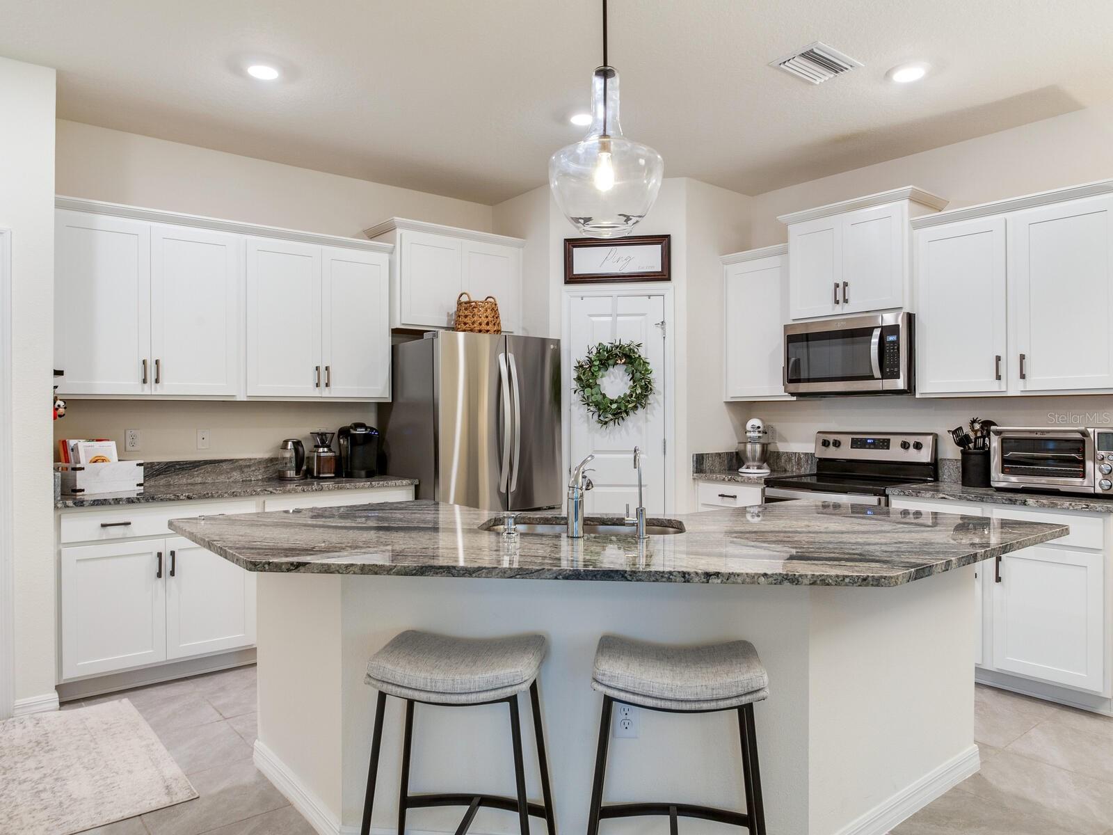 Kitchen with large breakfast bar