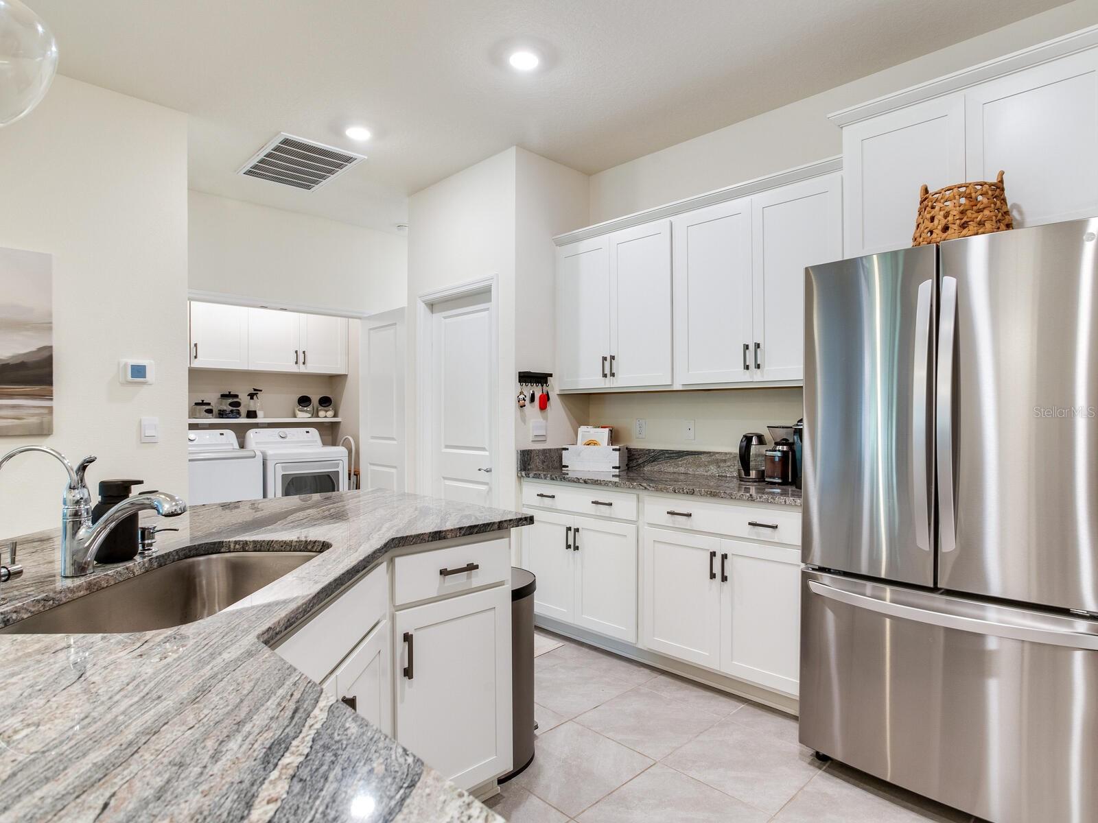 Kitchen with laundry area
