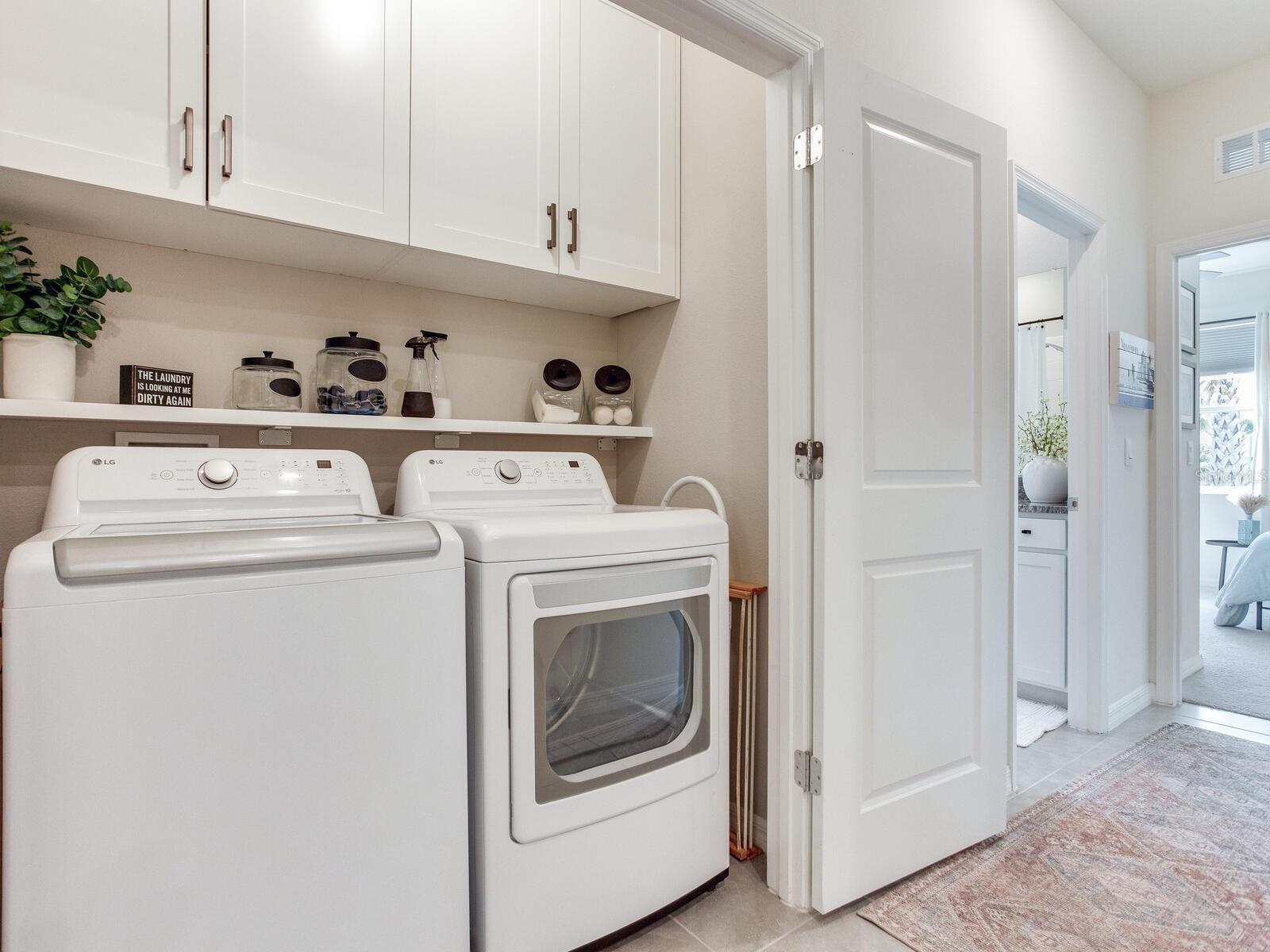 Laundry area with upgraded cabinetry