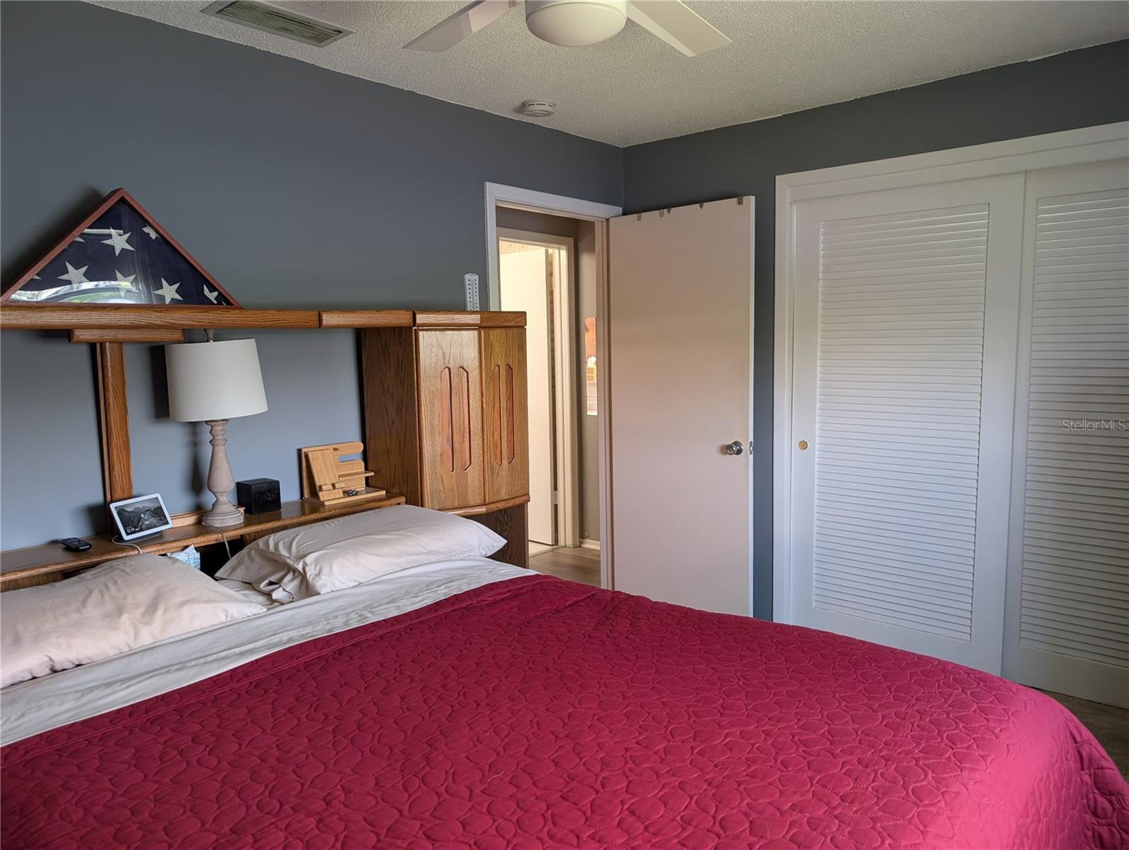 Guests/familly have their own private suite.  View to guest bath across hall...closet on right.