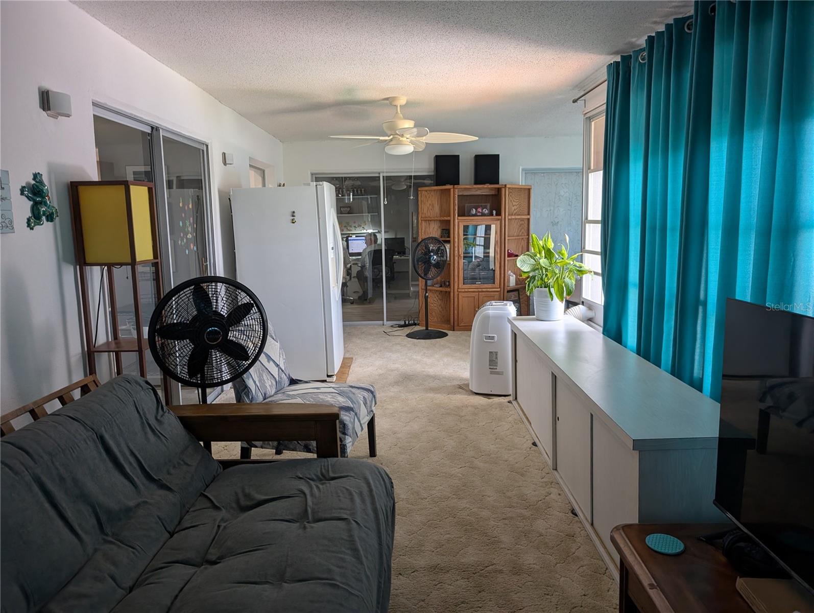View into Bonus area and guest bedroom.