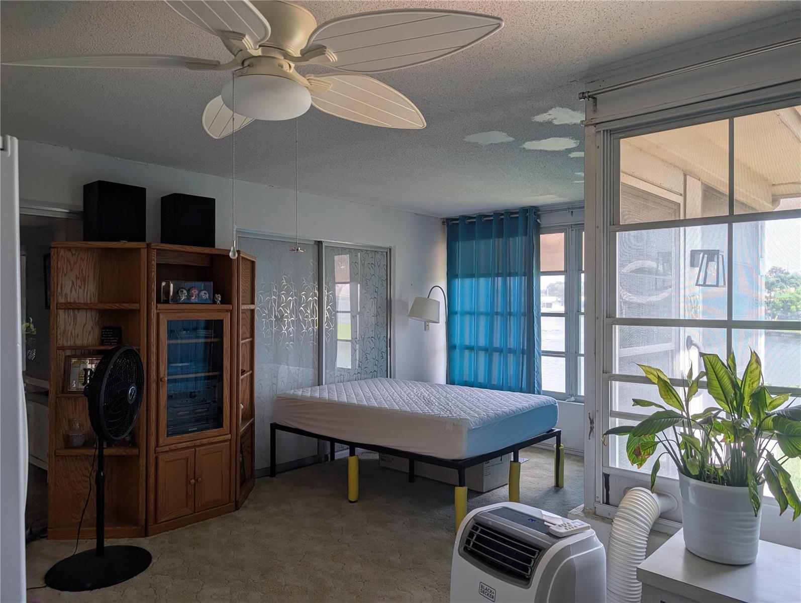 Entry into Florida room with view of the guest bedroom access.