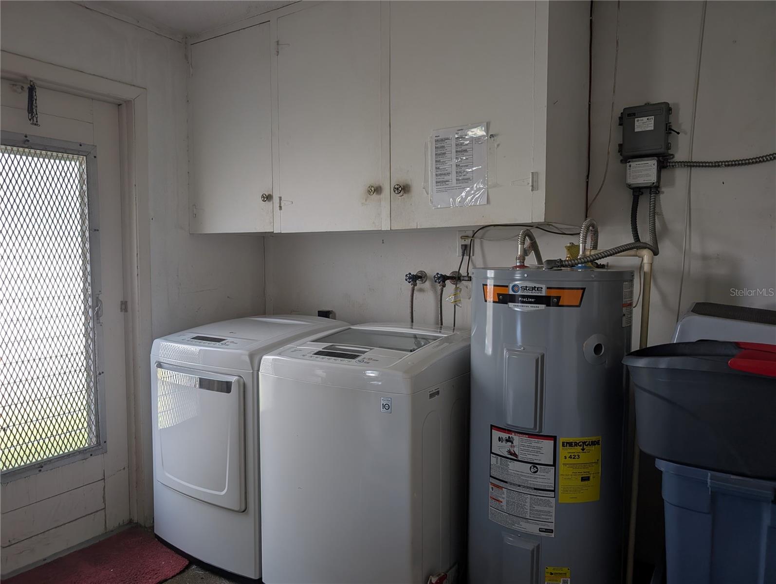 Laundry features a 2023 LG washer/dryer set, State water heater (2021) and updated Carrier HVAC system (2021).
