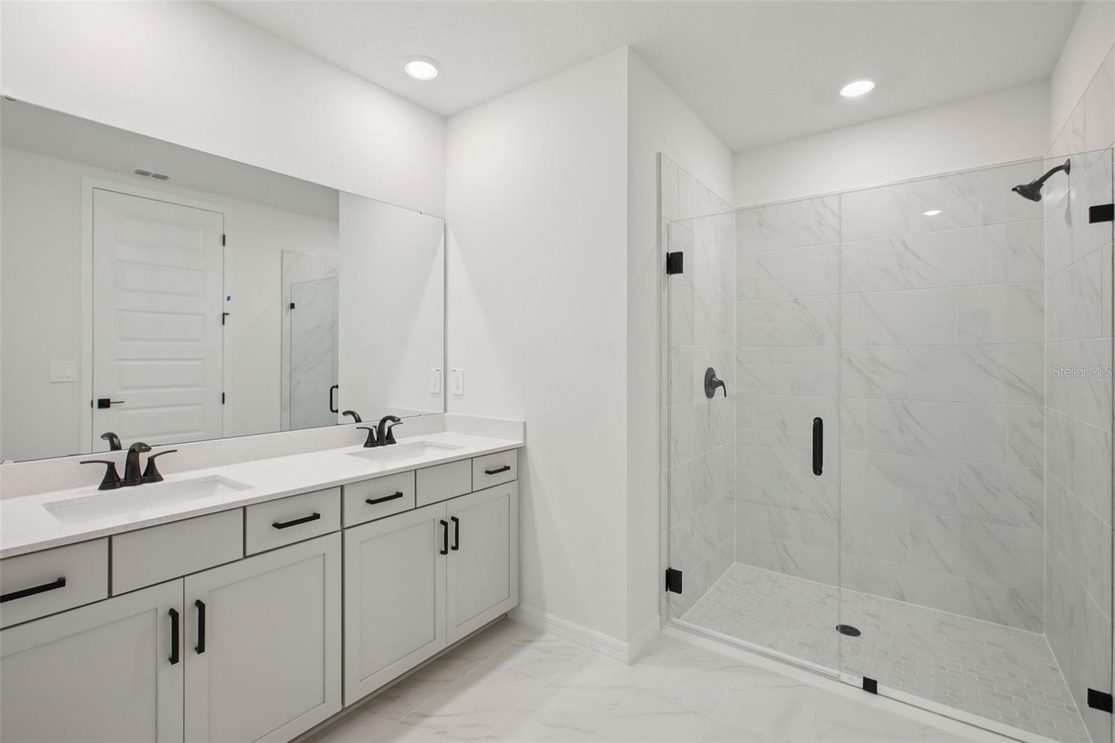 Interior photos are not of the actual home but are photos of the builder home with same floorplan with similar interior finishes and features.