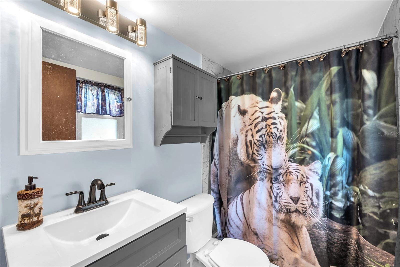 The primary en-suite bath with a walk-in shower.