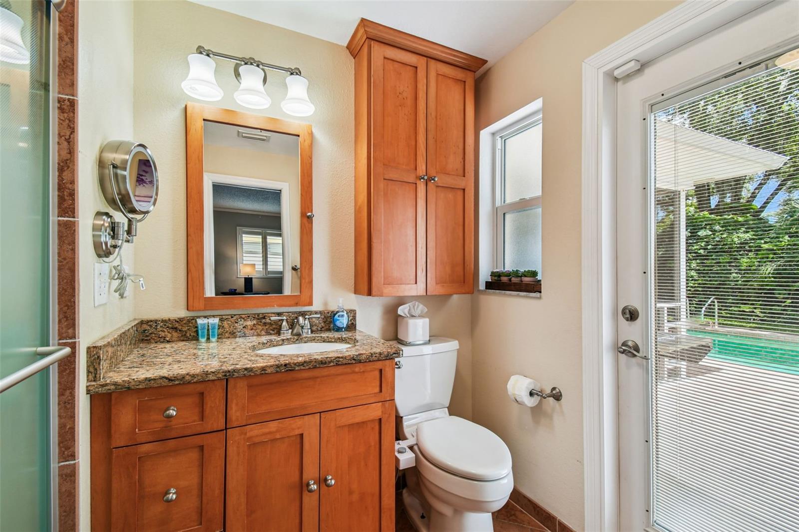 Master bathroom leads out to the Pool Area
