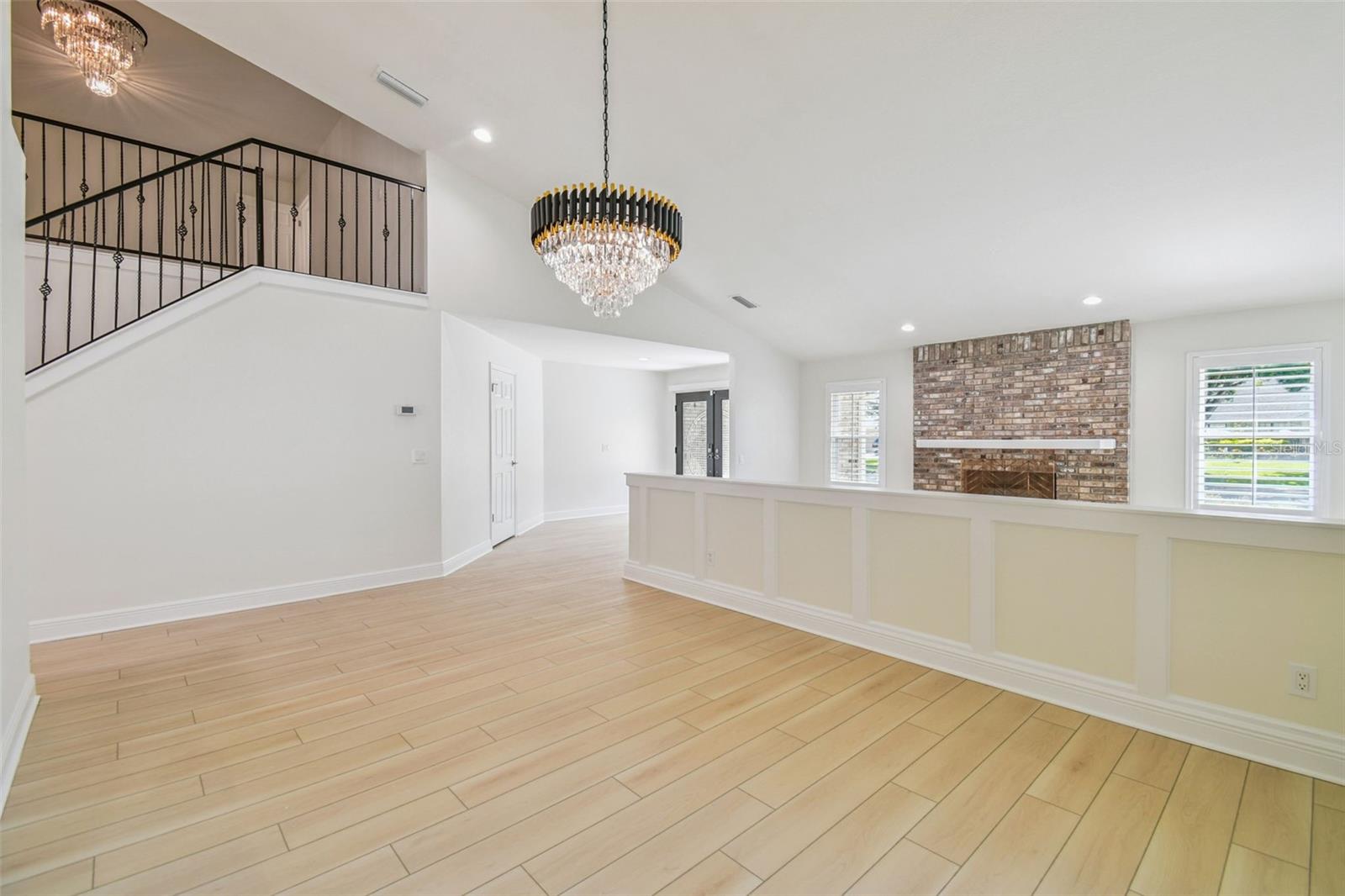 Formal Dining Room w/knee wall separation to Formal Living Room