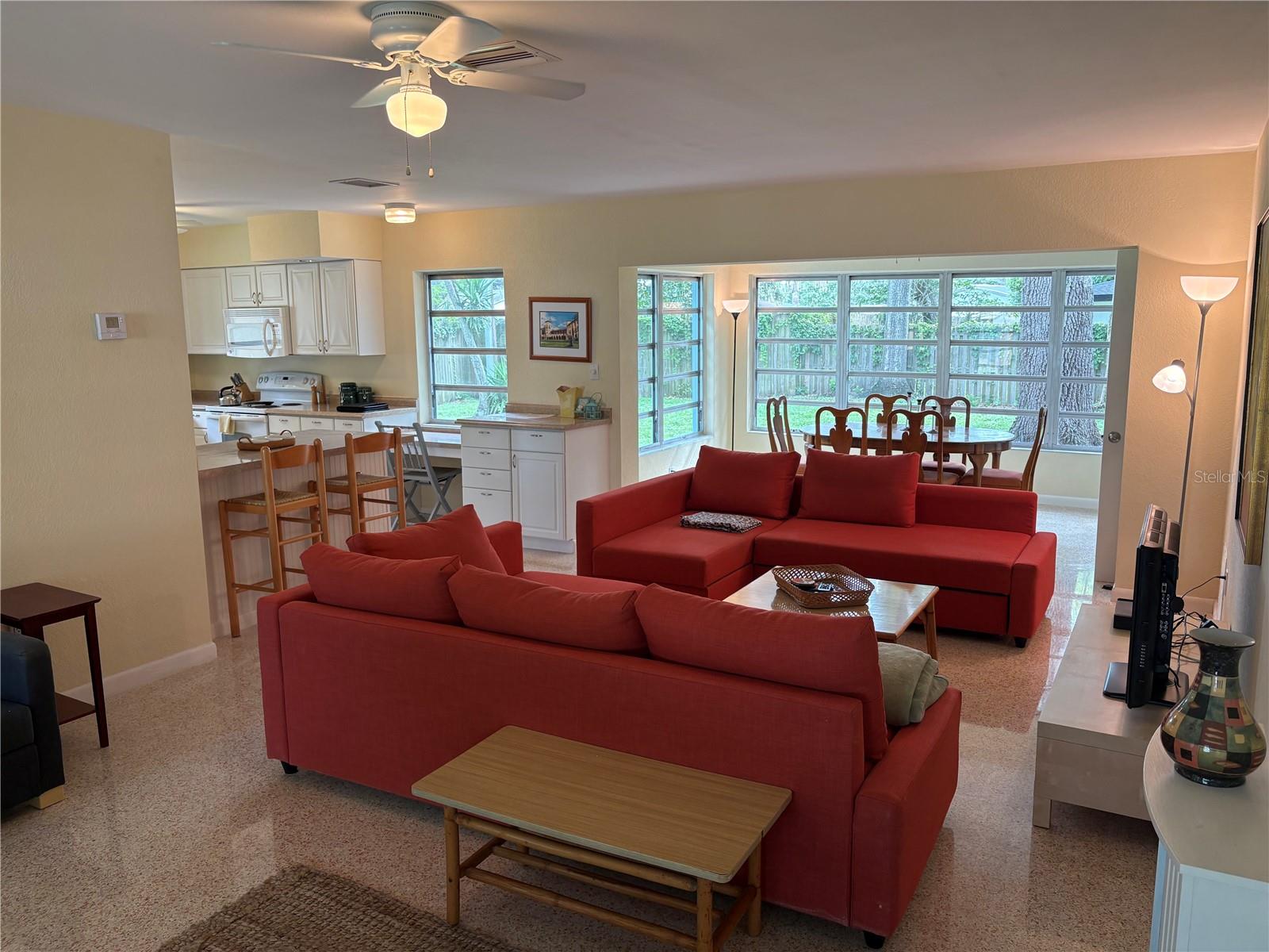 Living room looking toward kitchen and dining area.