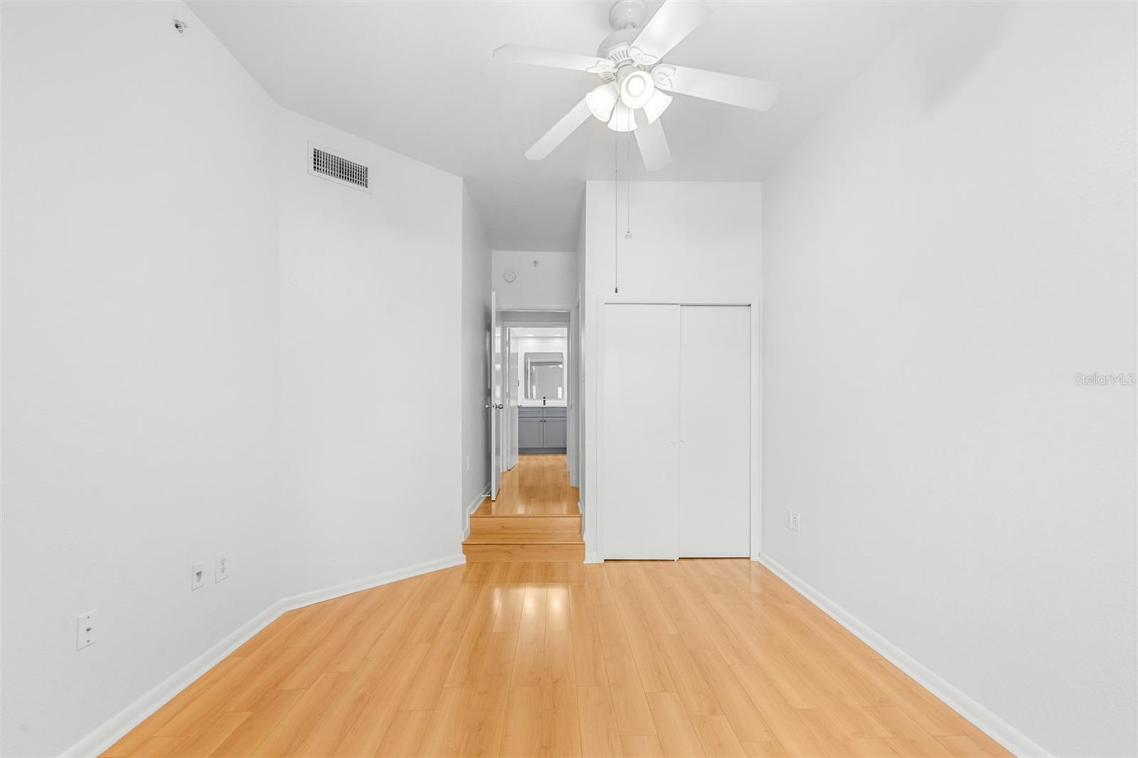 Owners suite high ceiling with fan