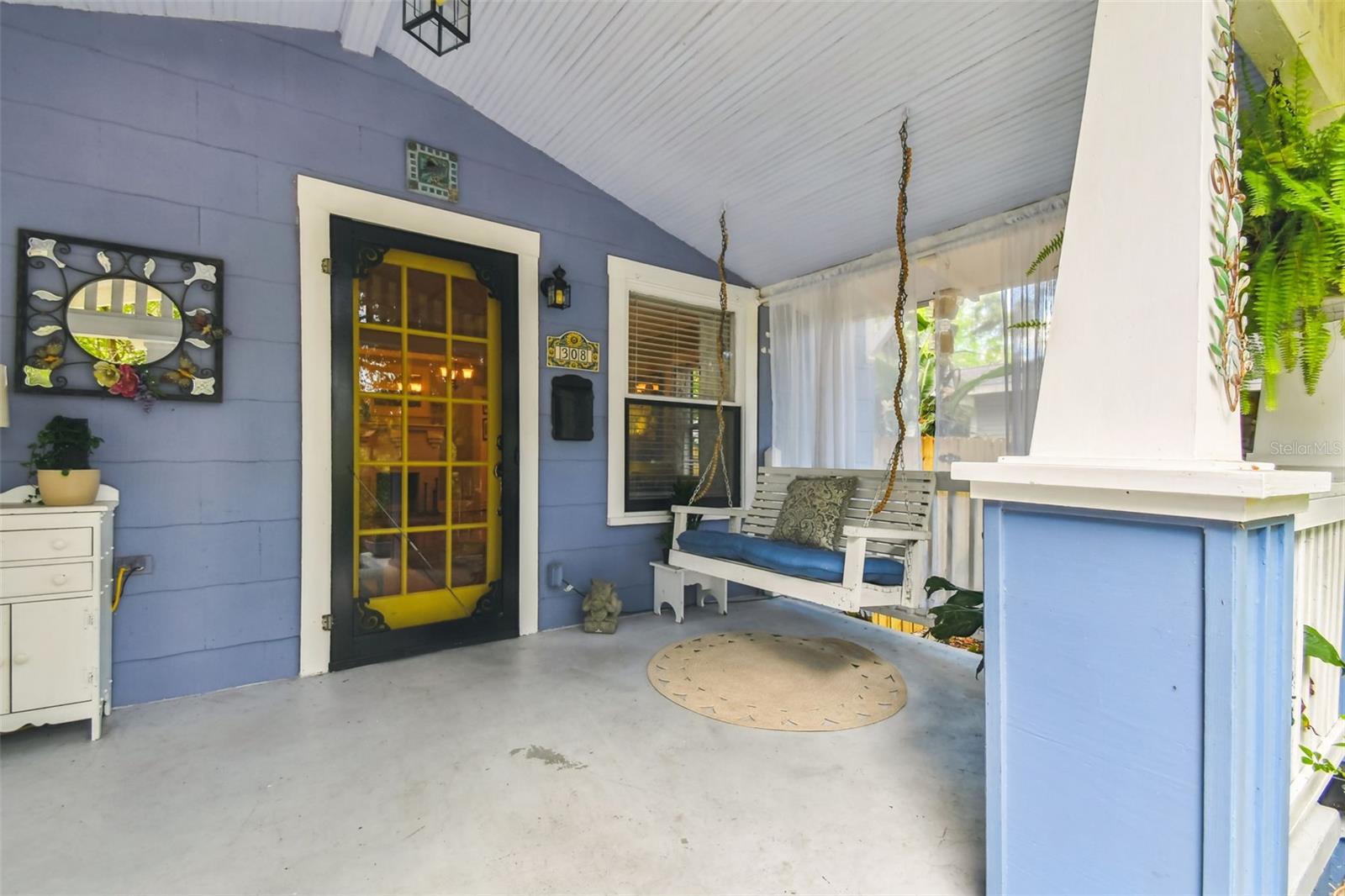 Inviting front porch with swing