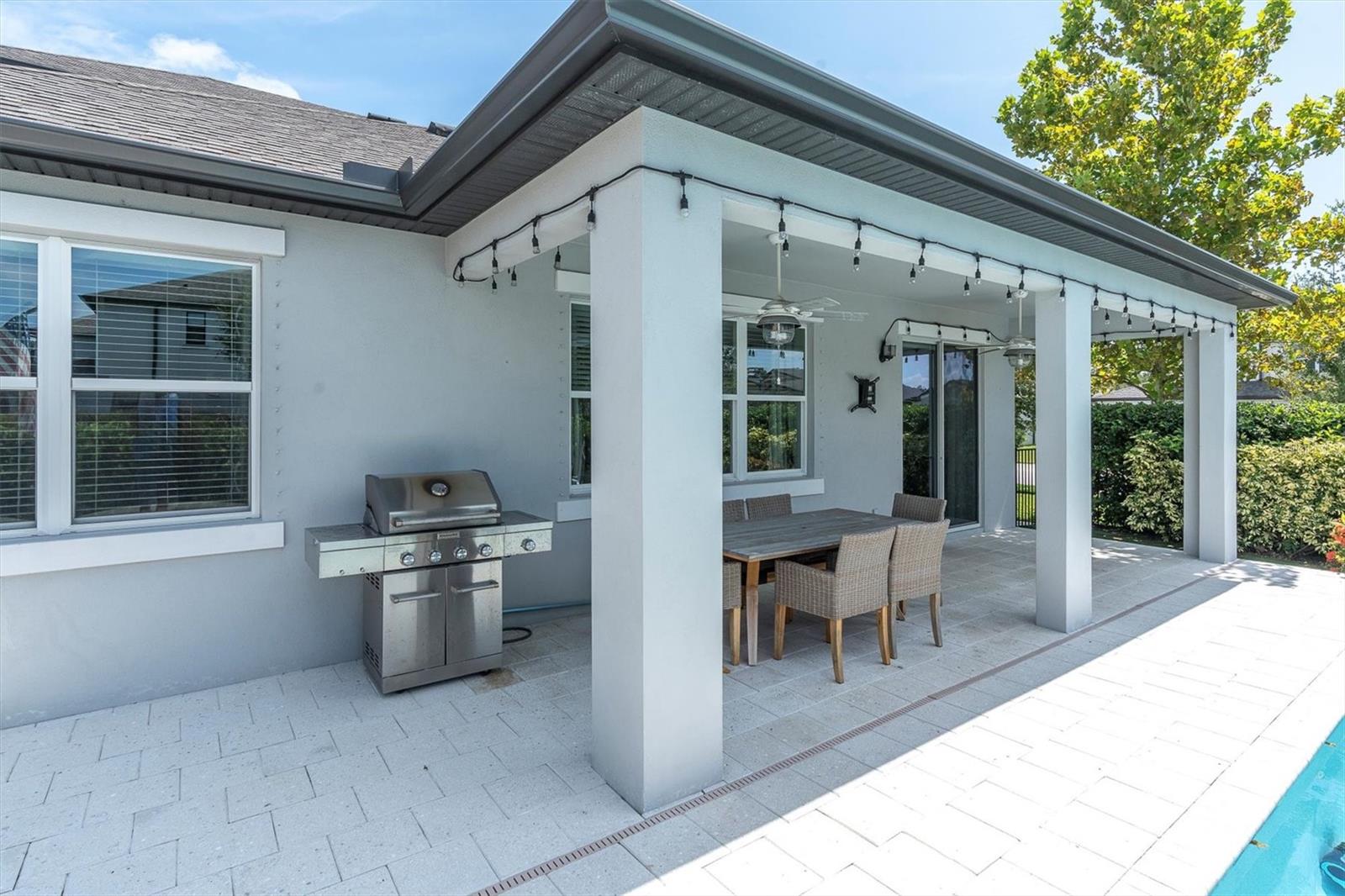 RELAX OR DINE ON THE COVERED LANAI WITH FANS