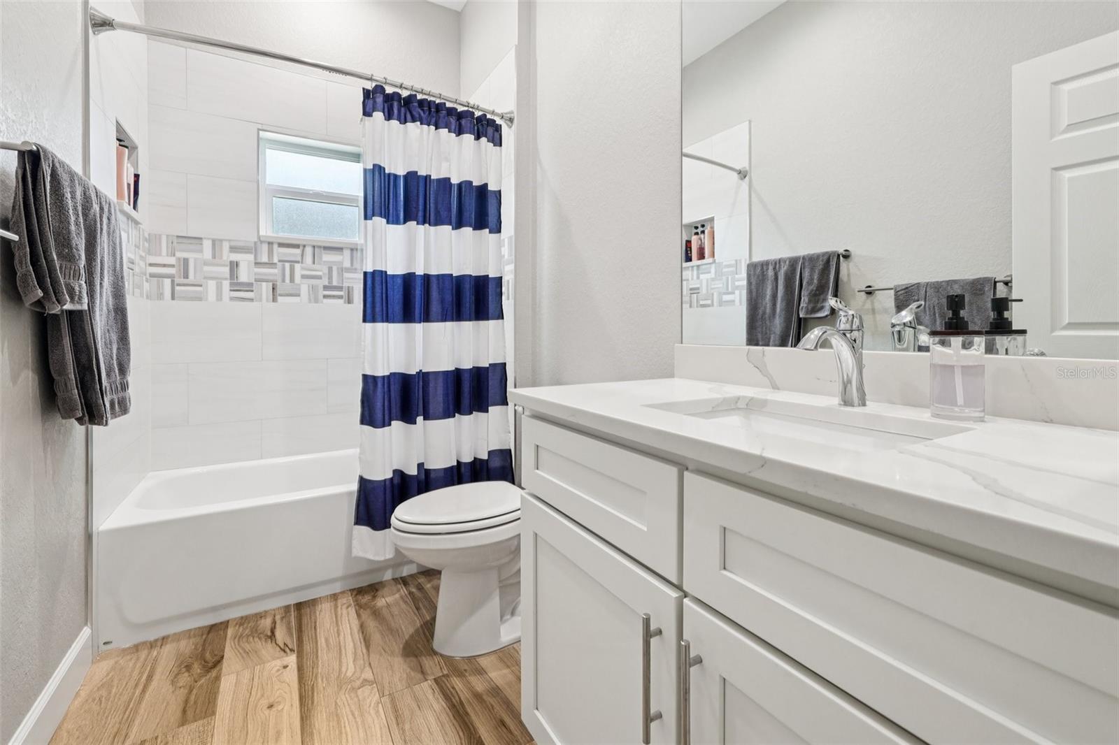 Bath 2 with huge quartz countertops