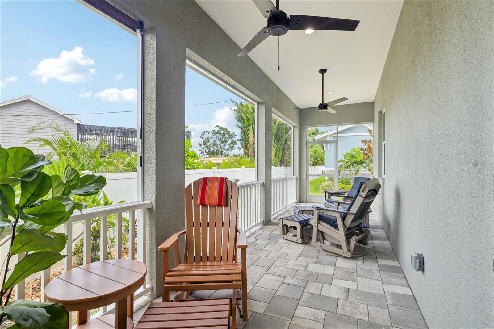 large back patio with screened in porch!