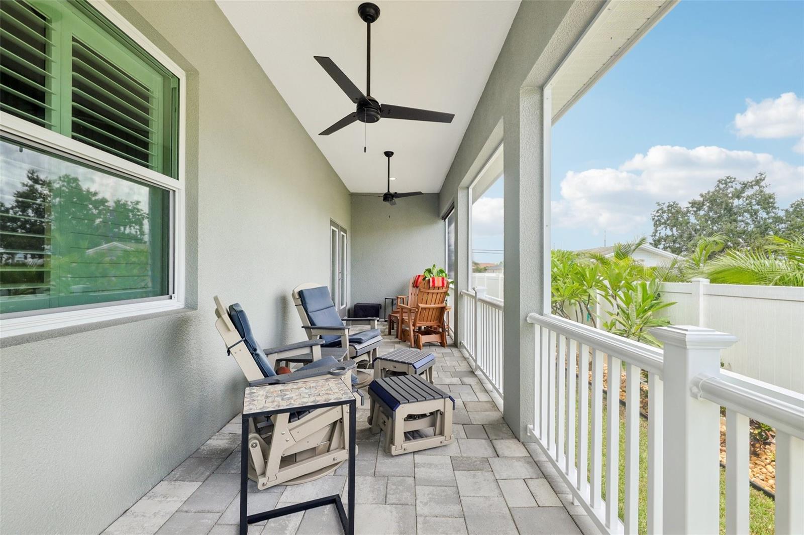 large back patio with screened in porch!