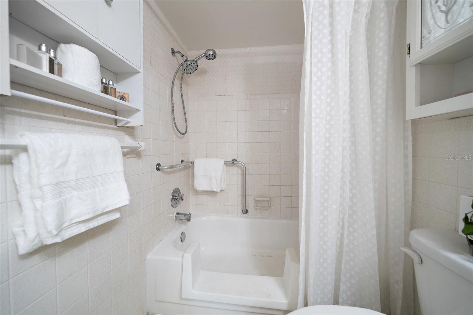 Plenty of storage and tub has been modified for easy entry.