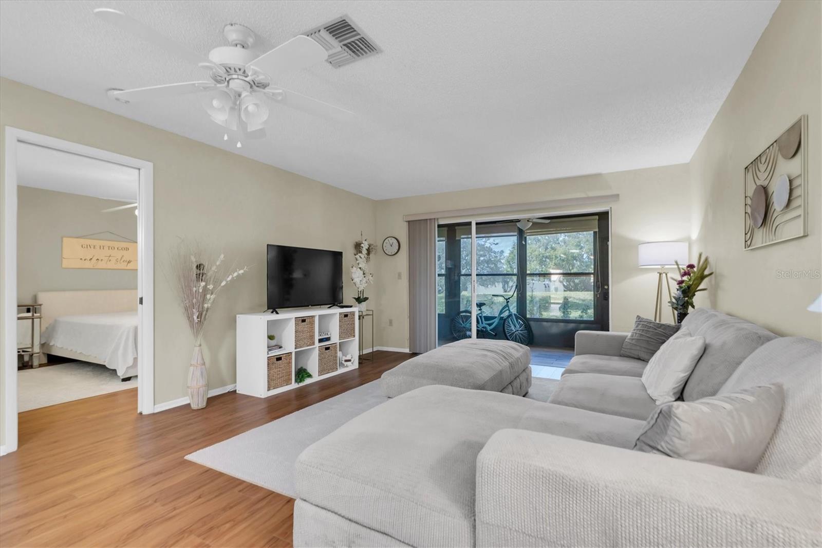 Living room with sliders to Florida Room