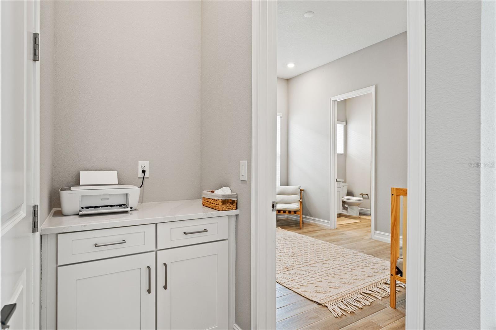 Downstairs hallway storage/ entry into bedroom 1