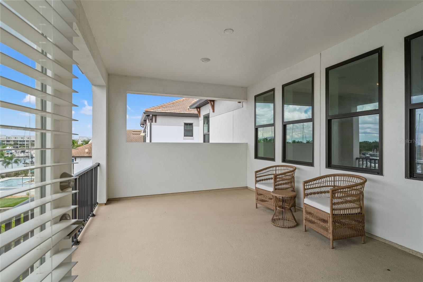 Upstairs private balcony with access from primary bedroom