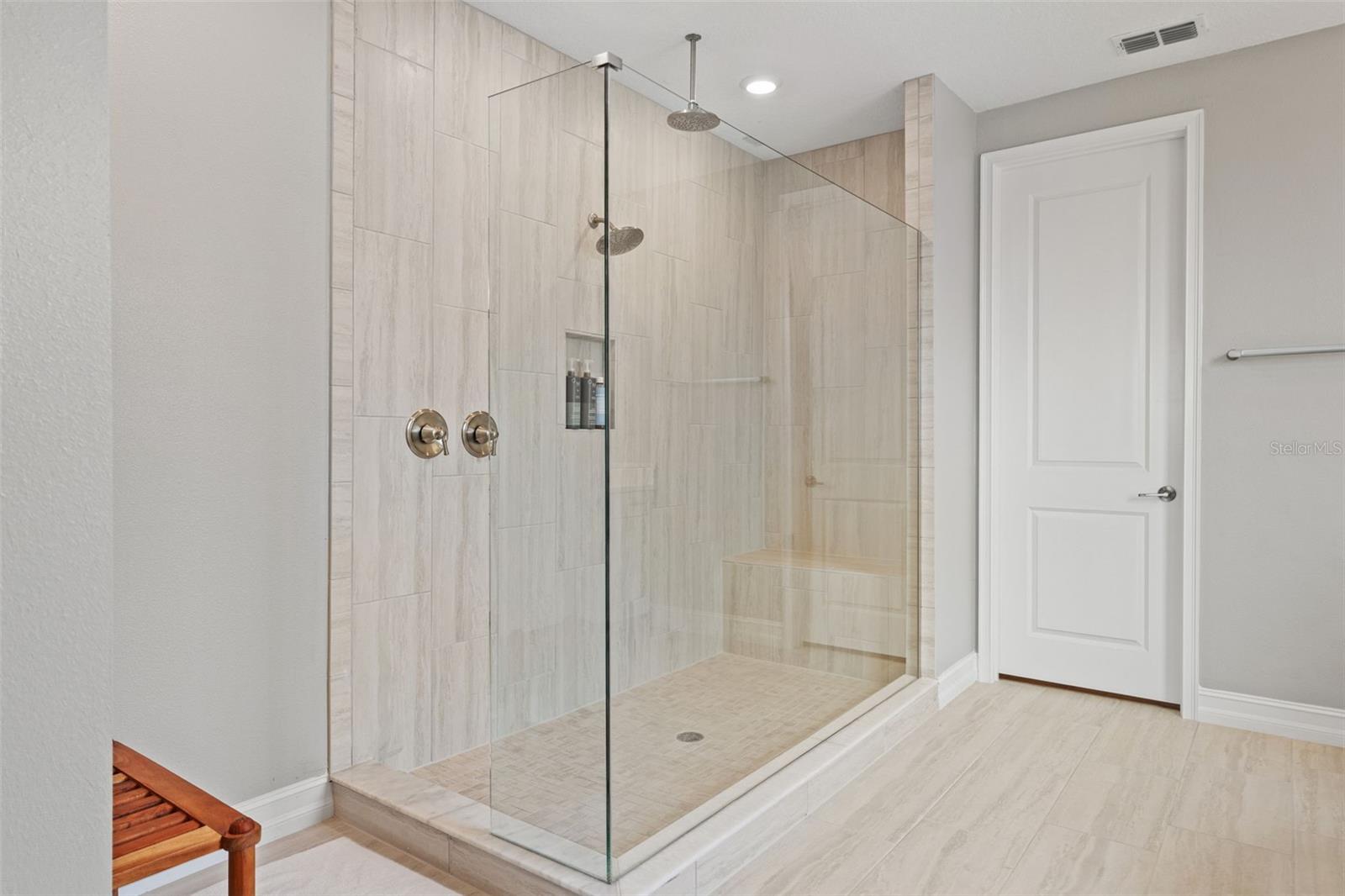 Primary walk-in shower with rain head