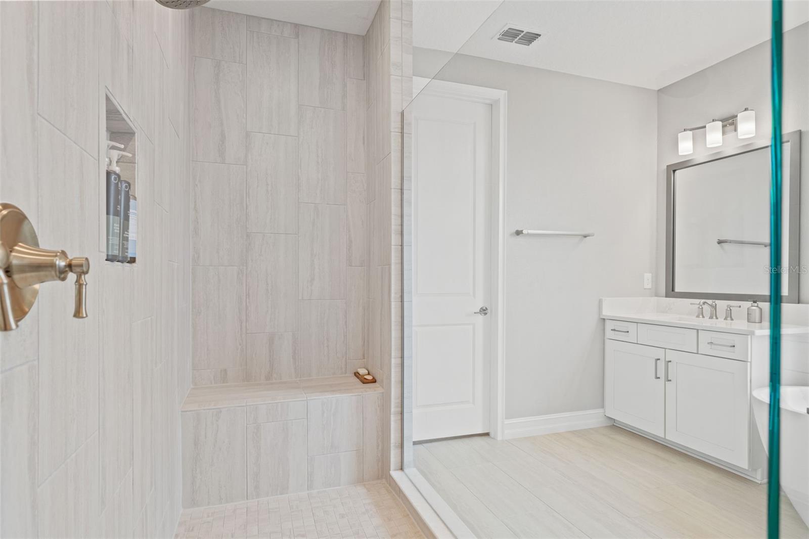 Primary shower with bench