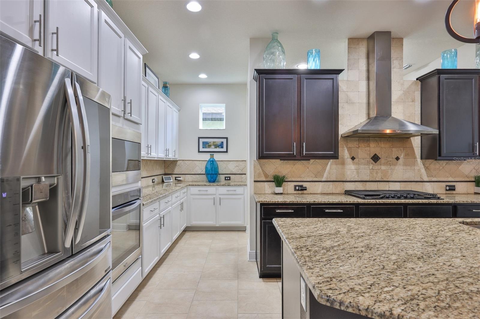 Kitchen leading to walkthru pantry
