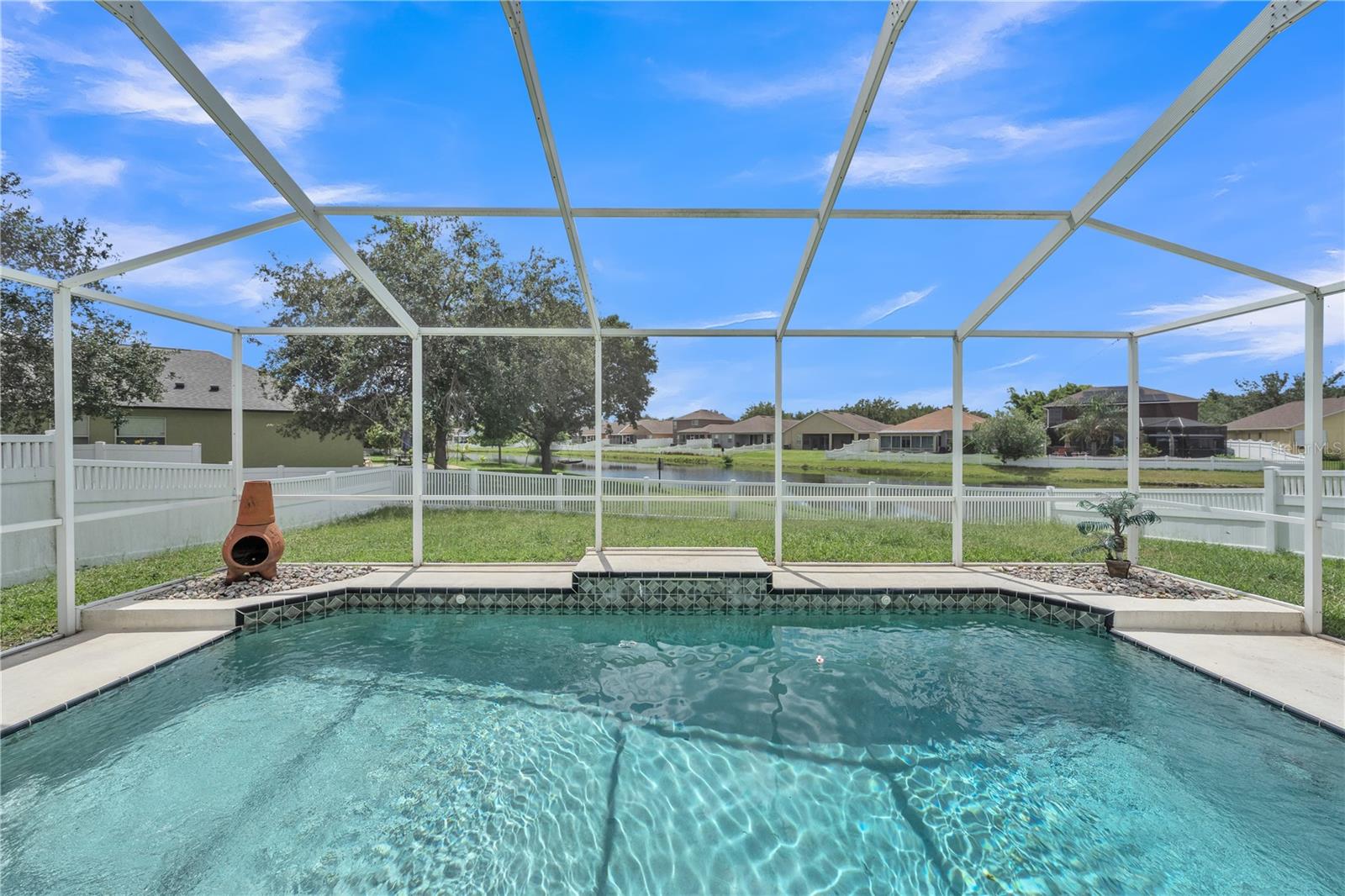 Perfect Sunsets, Dazzling Pool under screened enclosure