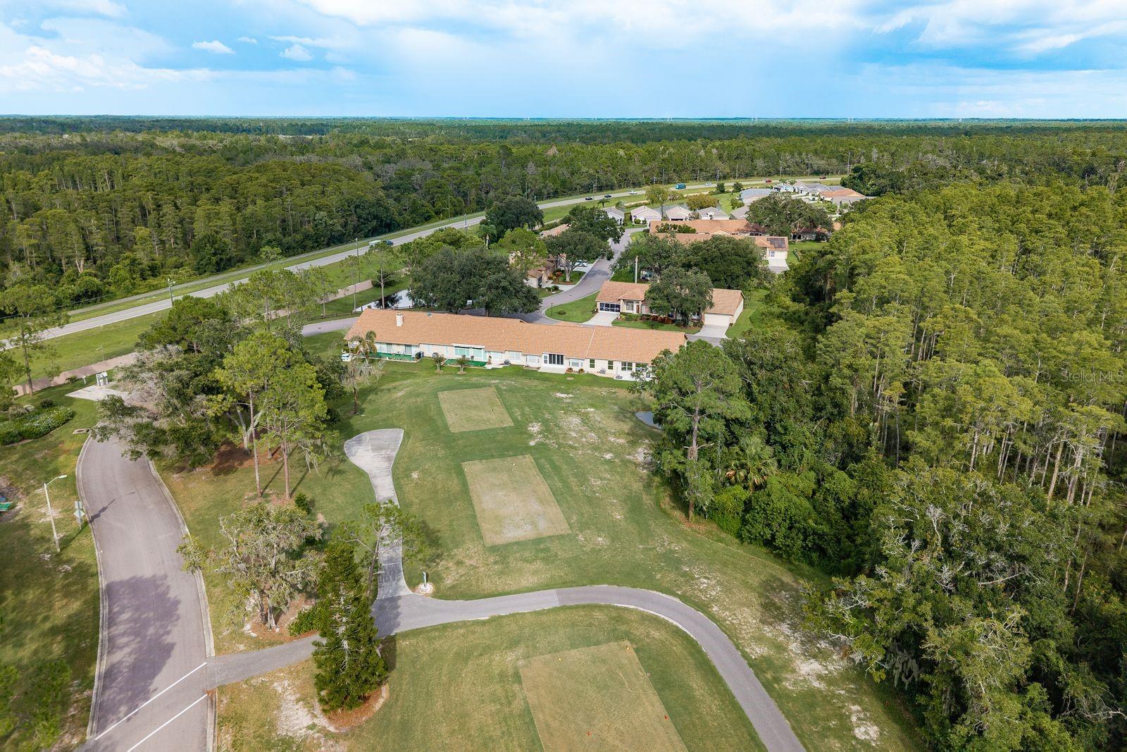 Aerial Back of Home and Golf Course