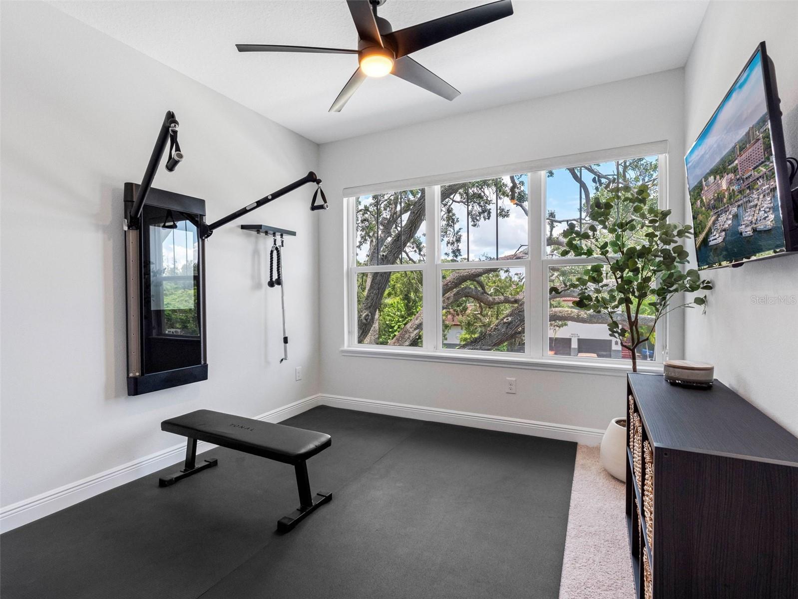 4th bedroom that is being used as an exercise room