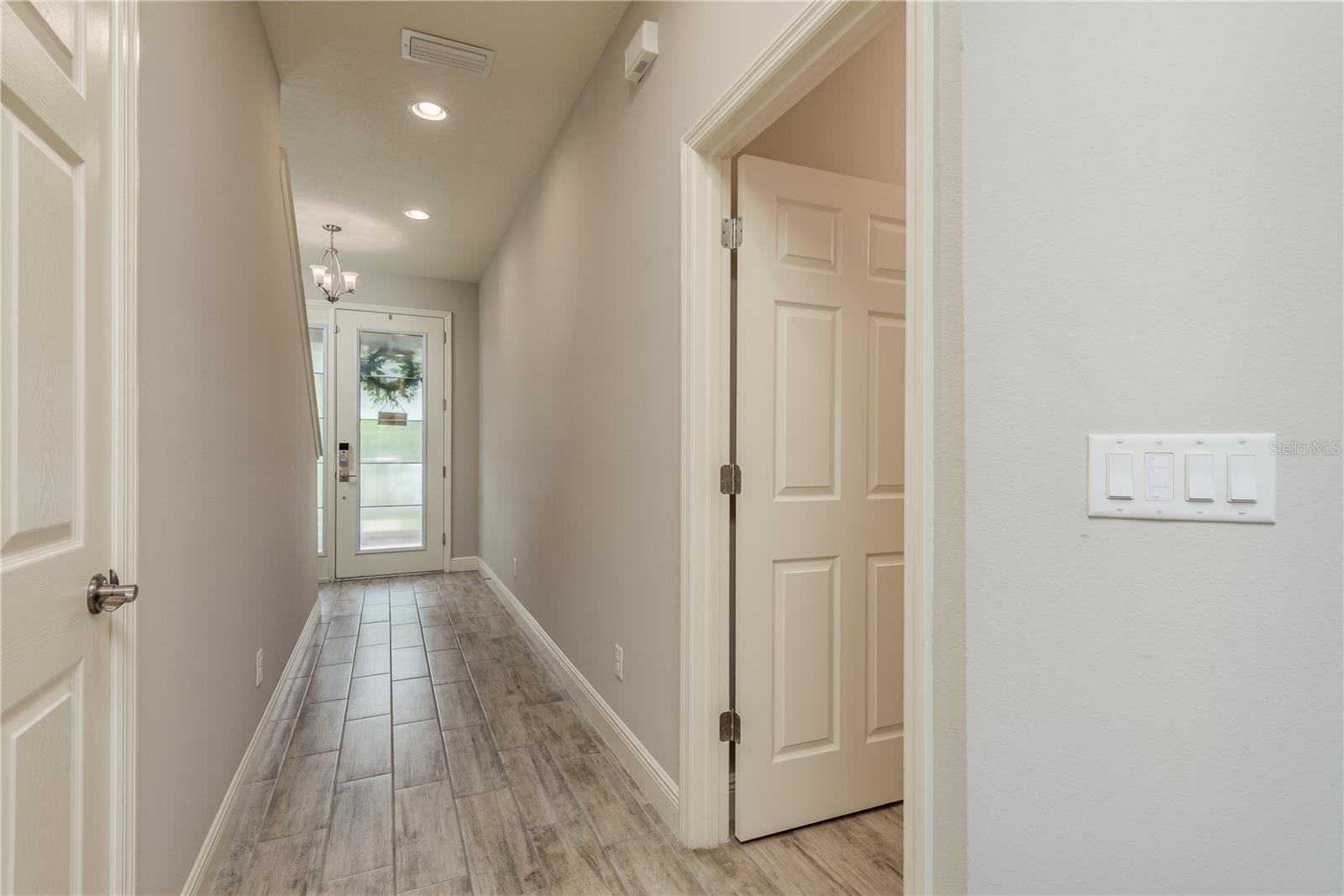 Wood toned Tile throughout the main level