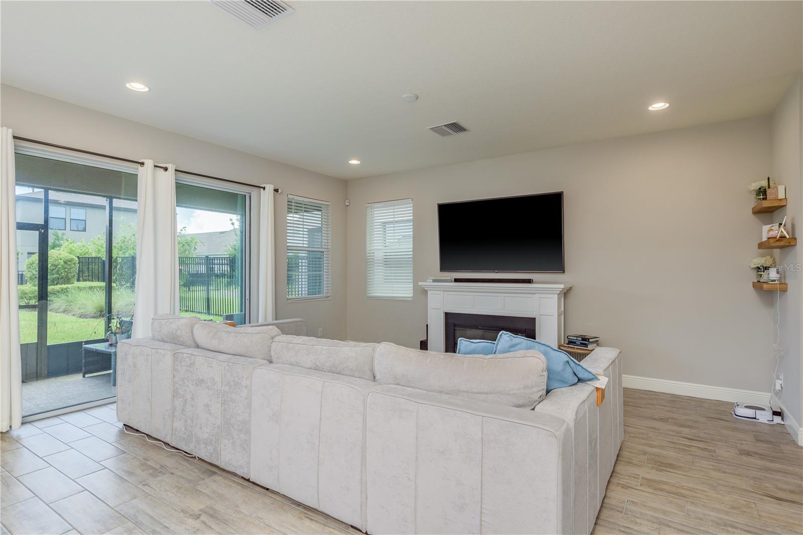 The Gathering Space. Fireplace is not permanent so lots of room for your entertainment systems
