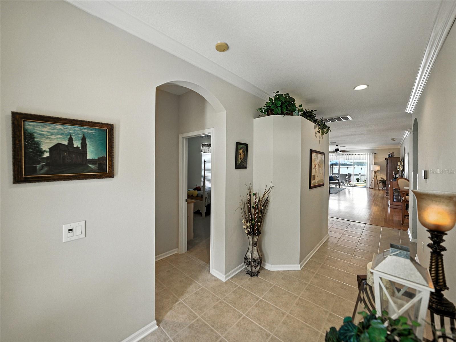 Looking down main hall from front door to sliding doors to lanai